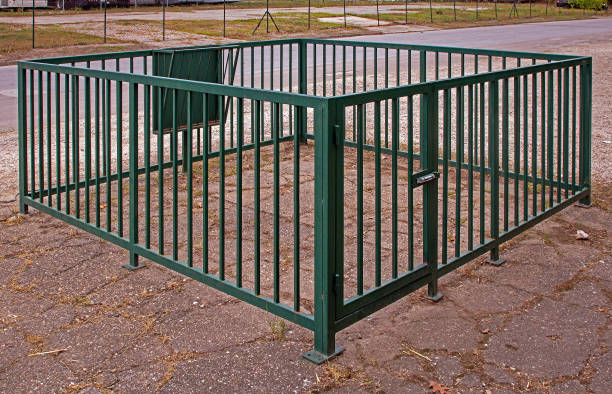 istock Empty metal cage on local rural farm 1398714685