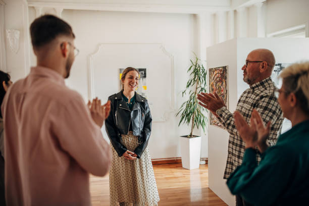 istock People applauding at gallery opening 1398714900