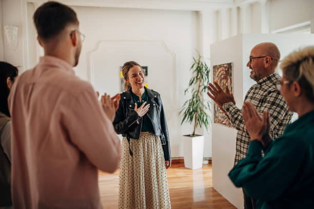 istock People applauding at gallery opening 1398714932