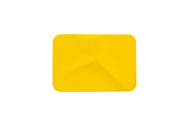istock Yellow plastic sticker label isolated on white background 1398719926