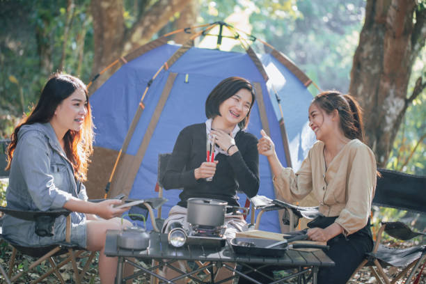 istock three bestie go camping in the forest 1398721541