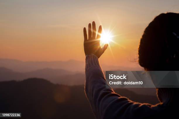 Woman Worship On Sunset Stock Photo - Download Image Now - Praising - Religion, Women, Heaven