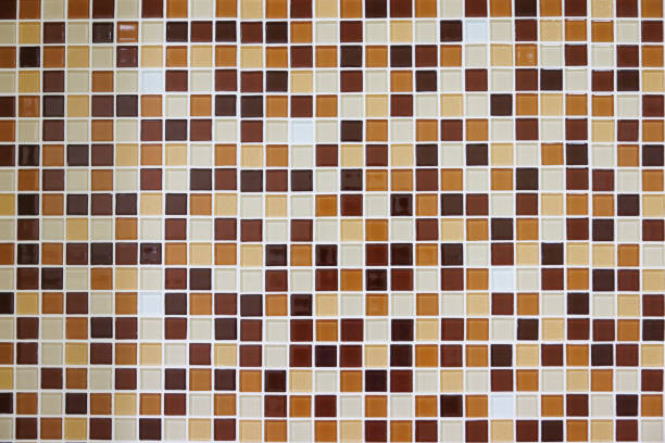 brown and white mosaic pattern in toilet wall. brown mosaic background and texture.