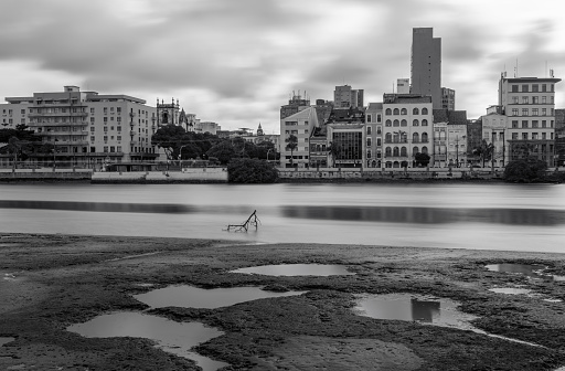 Recife, Pernambuco, Brazil - May 21, 2022:Long exposure view from Recife with its river in low tide.