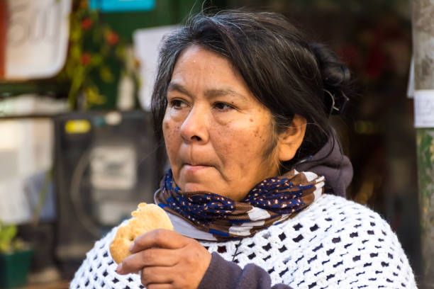 istock aboriginal woman, working in her flower stall, different ethnic groups, fighter 1398728802