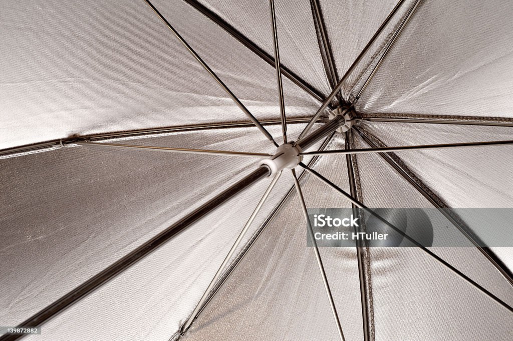 Inside a silver umbrella Abstract view of a photographer's equipment Abstract Stock Photo