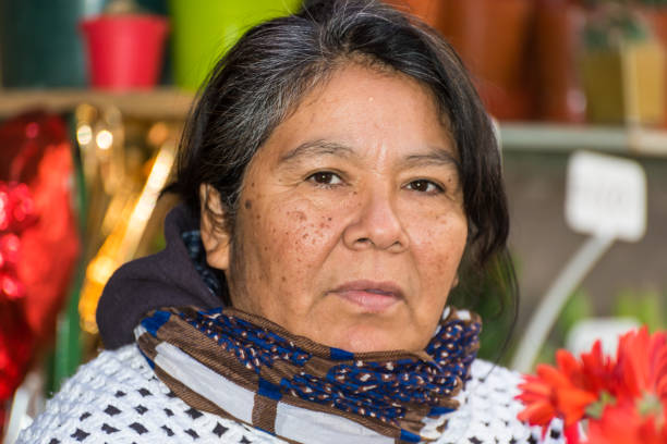 istock aboriginal woman, working in her flower stall, different ethnic groups, fighter 1398728833