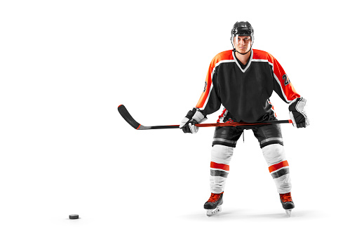 Professional hockey player start the game. Sports emotions. Hockey concept. Isolated on the white. Man