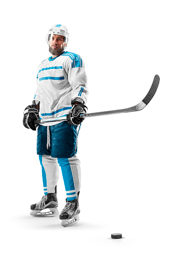 Professional hockey player. Isolated on white background. Hockey player in a helmet and gloves and a stick in his hands on a white background. Sports emotions. Man