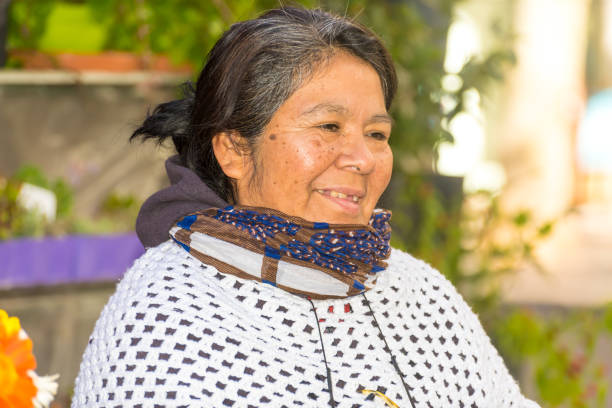 istock aboriginal woman, working in her flower stall, different ethnic groups, fighter 1398729444