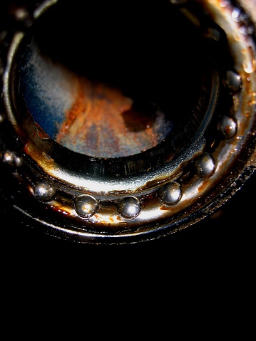 Ball bearings inside of a bicycle part.