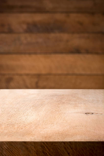istock wooden desk and wall, background or backdrop 1398735822