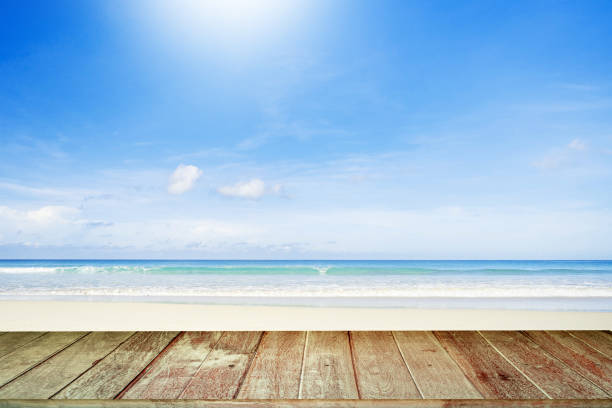 istock Brown Tabletop Against Beautiful Seascape And Tiny Cloud Blue Sky Background. 1398737076
