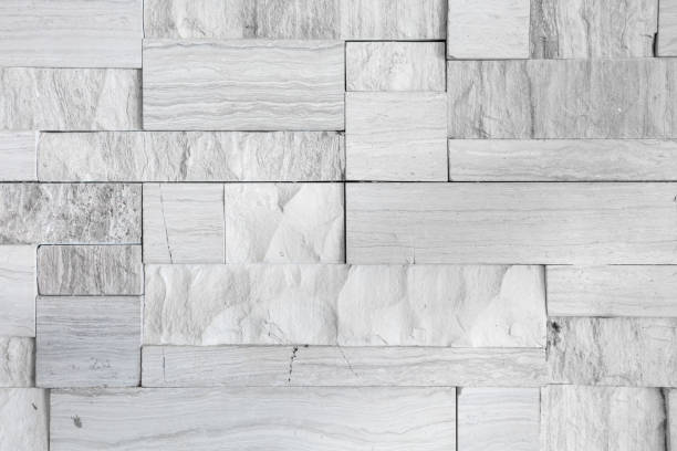 istock Pattern of the white stone wall texture background 1398738978