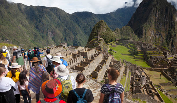 Tourists at Machu Picchu , Peru stock photo