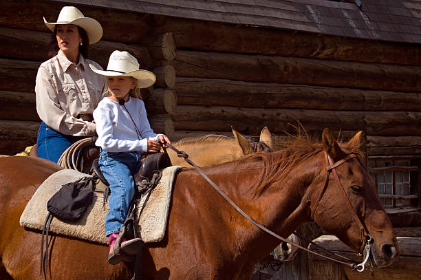 istock Horseback Mother and Daughter 139874827