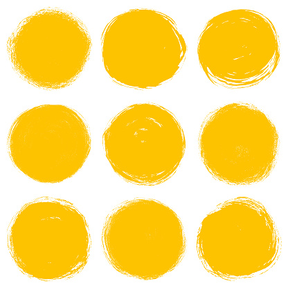 Set of grunge yellow circles. Isolated shapes on a white background