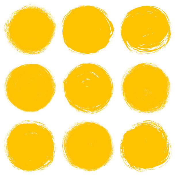 Grunge circles Set of grunge yellow circles. Isolated shapes on a white background smudged stock illustrations