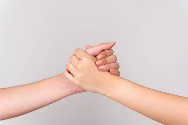 istock male and female hand shot 1398754646
