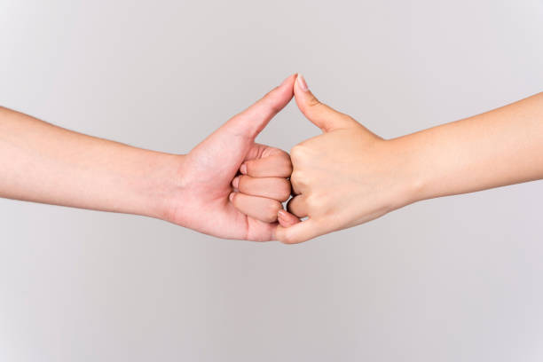 istock male and female hand shot 1398754648