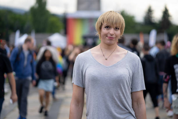 istock Transwoman standing outside looking at the camera 1398755778