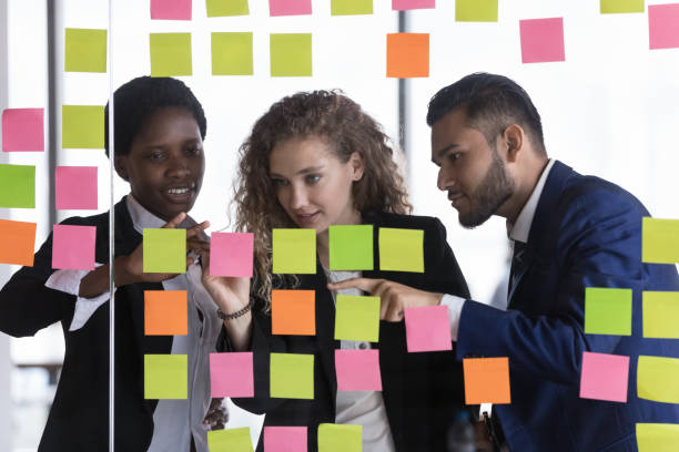 istock Motivated diverse business team planning project tasks 1398758271