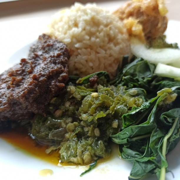 istock Nasi padang complete meal focused on green sambal 1398760323