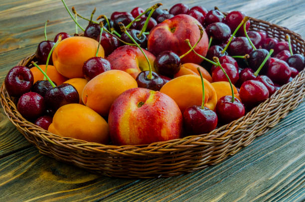 istock Bright summer fruits in basket 1398761452
