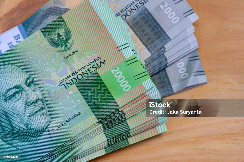Indonesian money currency, Rupiah, in selected focus Indonesian Currency Stock Photo