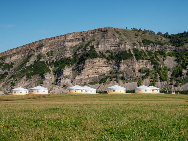 Southern Urals, Bashkortostan. Bashkir yurts on the background of the mountain.