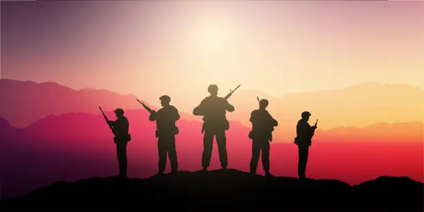 Vector illustration of Silhouettes of soldiers standing guard in a sunset landscape