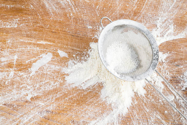 istock culinary utensils sprinkled with flour on a wooden table. culinary background. 1398764060