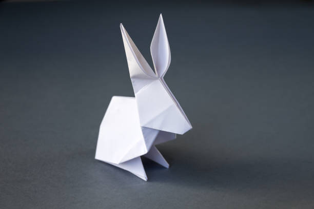 istock White paper rabbit origami isolated on a grey background 1398764180