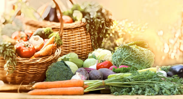 istock Fresh organic vegetable in wicker basket on table 1398766550