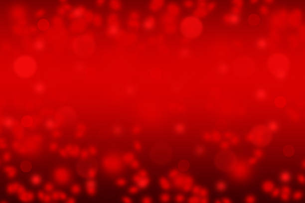 istock red abstract bokeh background with soft shiny texture of star for Christmas and Valentine. 1398769557