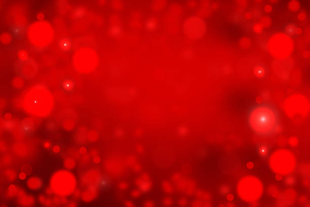 istock red abstract bokeh background with soft shiny texture of star for Christmas and Valentine. 1398769574