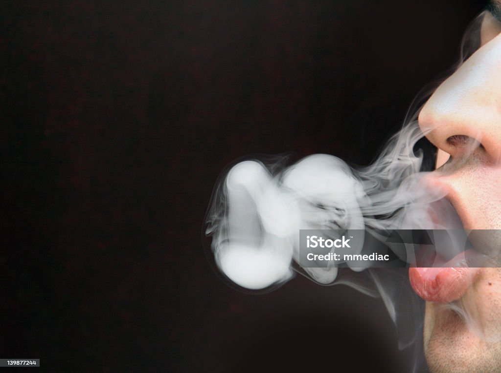 Smoking And Blowing O’s With The Smoke 1 Smoking And Blowing Oâ??s With The Smoke 1 Accidents and Disasters Stock Photo