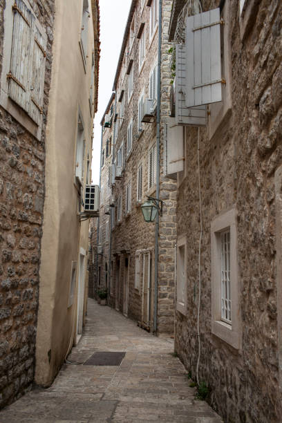 istock Narrow street 1398772900