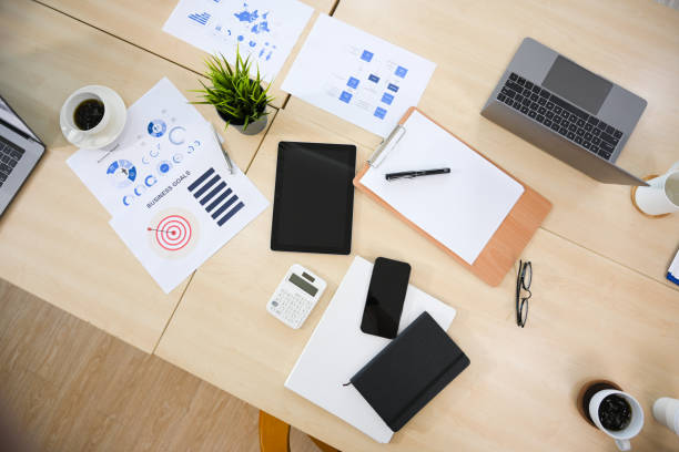istock Overhead shot, Business meeting table or conference table with accessories. 1398774246
