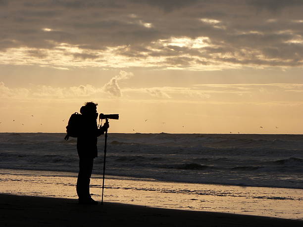 istock Photographer on the beach 139877706