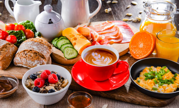istock Breakfast served with coffee, scrambled eggs, cereals and ham 1398778169