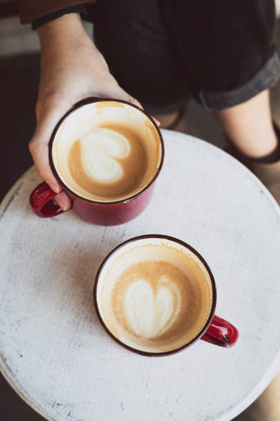 istock two red cups of coffee on the table 1398778232