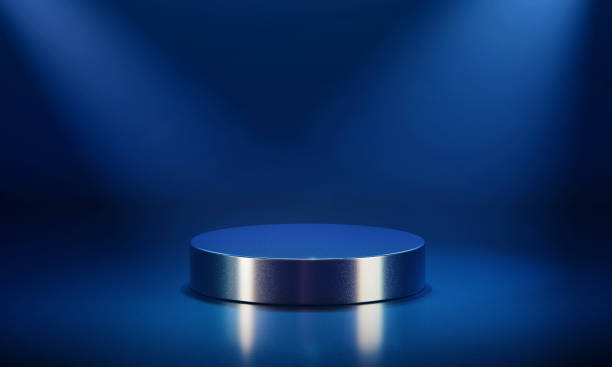 istock Blue colour low round empty podium lit by spotlight. 3d computer graphic template of displaying place for your products. Blank template. 1398778685