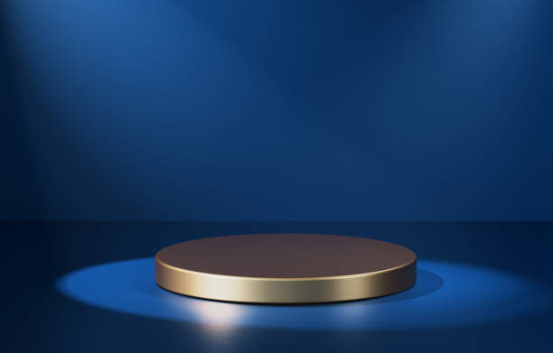 Golden colour low round empty podium lit by spotlight. 3d computer graphic template of displaying place for your products.