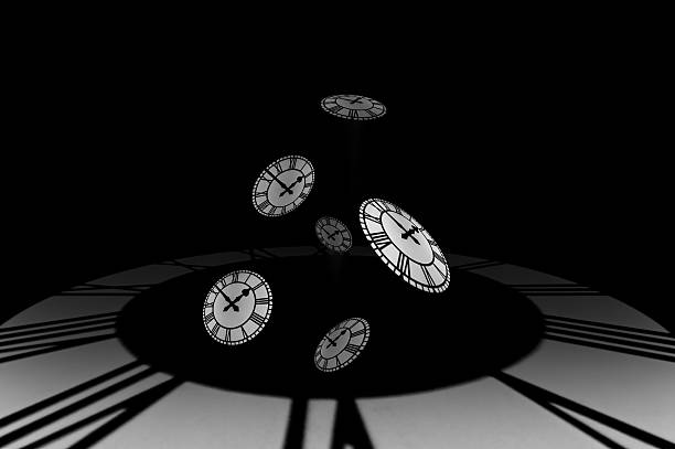istock clockfaces fall out of a timewell, time passing. 139878181