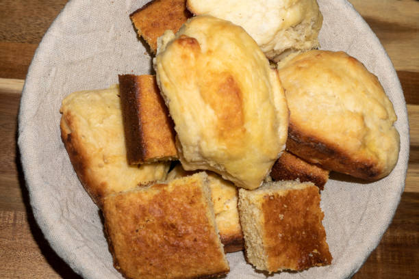 Bread Basket Yeast Rolls and Cornbread in a Basket for Serving bread bun corn bread basket stock pictures, royalty-free photos & images