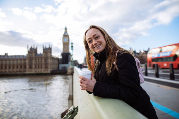 istock Woman having fun on Westminster Bridge 1398783058