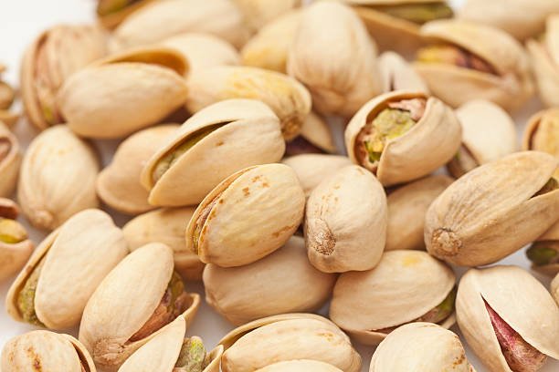 istock Shelled pistachio isolated on white background 139878405