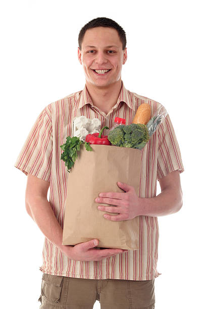 istock Man holding shopping bag 139878415