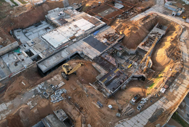 istock Construction site with tower cranes on construction. Foundation slab for monolithic reinforced. 1398787322